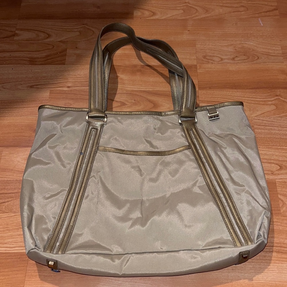 Tumi Beige Tote with Gold Trim